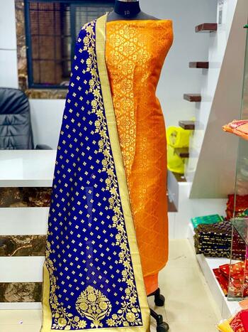 Orange Banarasi Silver Zari Work Designer Unstitched Salwar Suit For Women