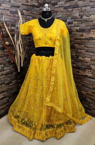 Yellow Color Stylish Soft Net Glitter Coding Thread Embroidered Work Semi Stitched Lehenga Choli