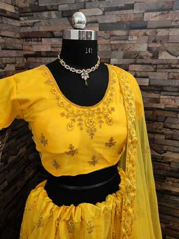 Yellow Color Stylish Soft Net Glitter Coding Thread Embroidered Work Semi Stitched Lehenga Choli