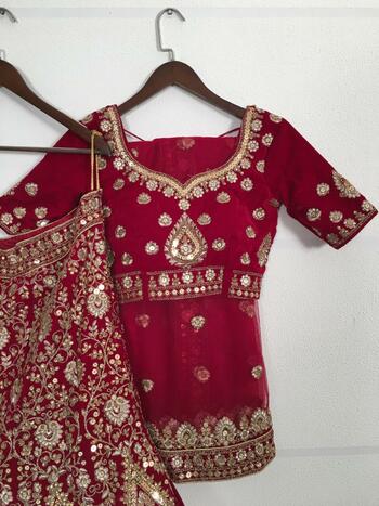 Infatuating Maroon Color Wedding Wear Velvet Sequence Thread Stone Zari Embroidered Work Lehenga Choli