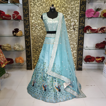 Exquisite Firozi Color Wedding Wear Satin Printed Sequence Work Lehenga Choli