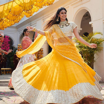 Delightful Mustered Yellow Color Embroidered Satin Lehenga Choli