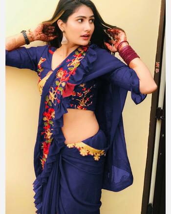 Absorbing Navy Blue Color Georgette Ruffle Fancy Embroidered Work Border Festive Wear Saree Blouse