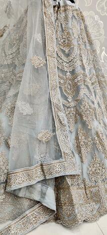 Pretty Grey Color Bridal Wear Diamond Embroidered Thread Zari Work Soft Net Semi Stitched Lehenga Choli