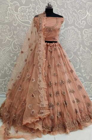 Artistic Peach Color Bridal Net Soft Design Embroidered Zari Thread Work Festive Wear Lehenga Choli