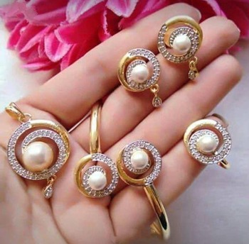 Wedding Wear White Color Diamond Golden Imitation Necklace Set