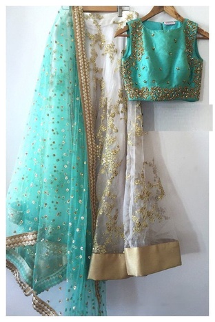 Beautiful White Color Net Embroidered Wedding Wear Lehenga Choli Design Online