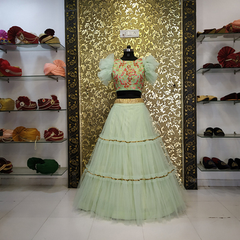 Elegant Light Green Color Net Lace Ruffle Work Wedding Wear Lehenga Choli Design