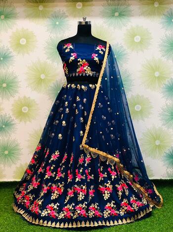 Flaunt Navy Blue Color Thread Embroidered Work Net Function Wear Lehenga Choli