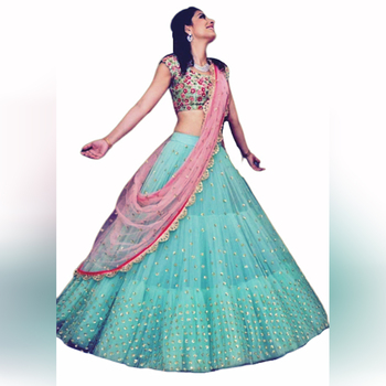 Stunning Sea Green Color Party Wear Net Ruffle Lehenga Choli Design