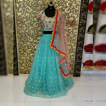 Stunning Sea Green Color Party Wear Net Ruffle Lehenga Choli Design