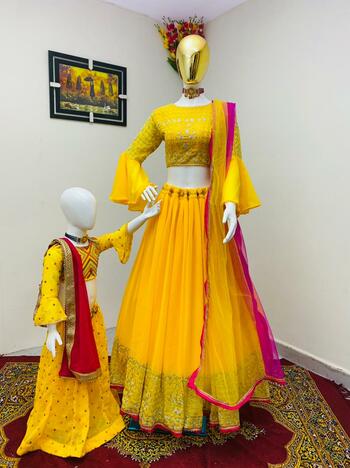 Enthralling Yellow Color Wedding Wear Georgette Embroidered Work Latest Mother Daughter Combo Lehenga Choli