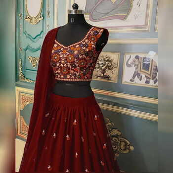 Cuddly Maroon Color Net Ruffle Georgette Thread Embroidered Work Designer Lehenga Choli For Wedding Wear
