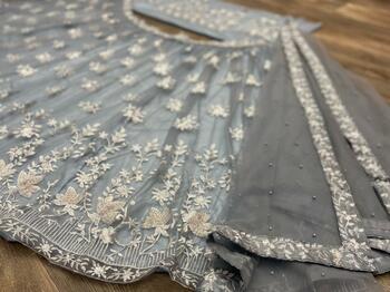 Engrossing Grey Color Function Wear Soft Net Embroidered Work Lehenga Choli