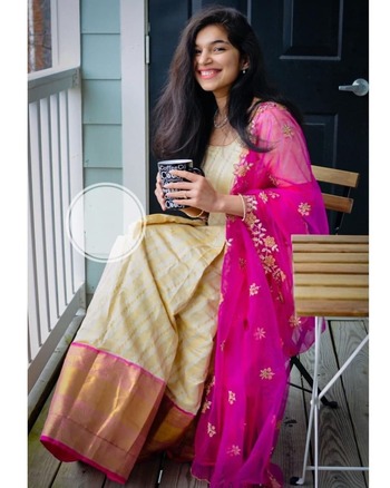 Inviting Cream Color Banarasi Silk Weaving Zari Work Wedding Wear Gown Dupatta