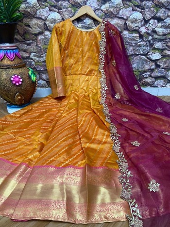 Pleasant Mustard Color Occasion Wear Banarasi Silk Design Zari Weaving Work Gown Dupatta